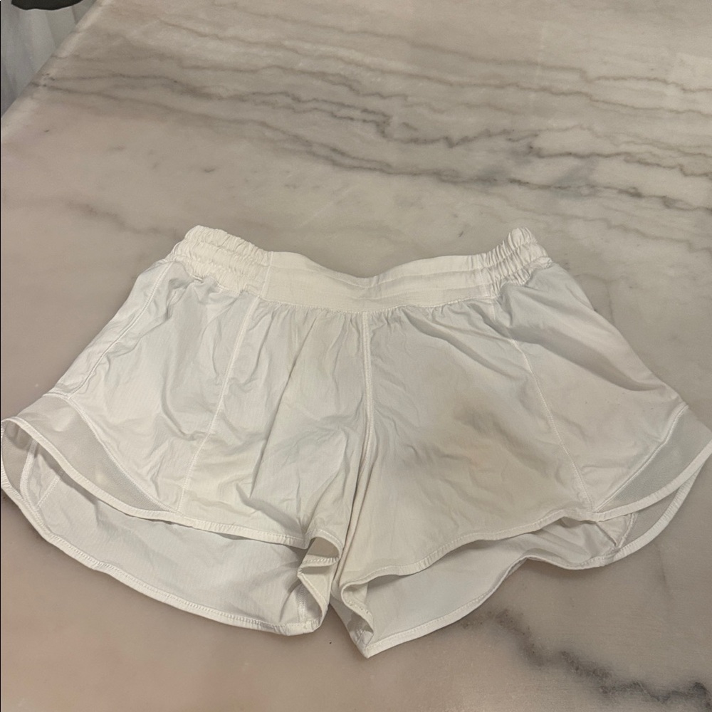 Lululemon 8 White Athletic Shorts w/ small off-white mark as picture on front
